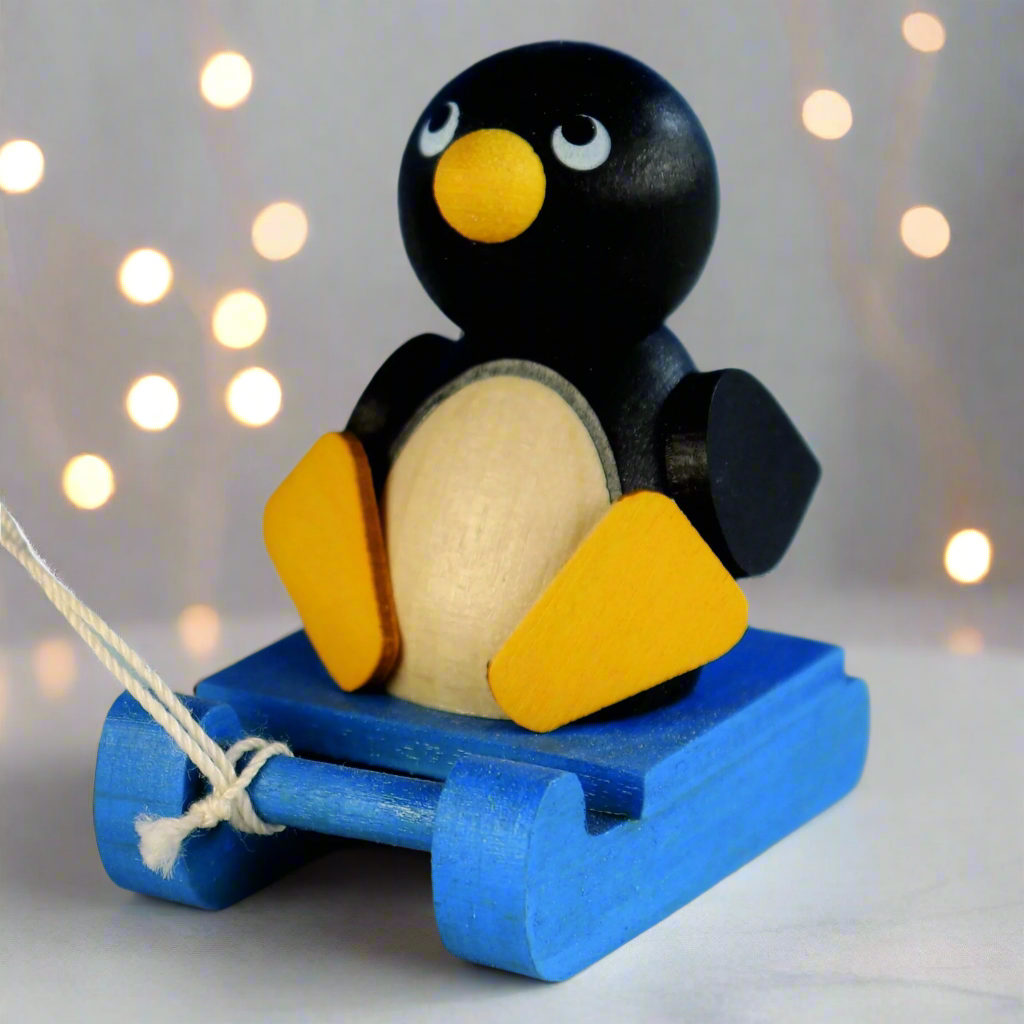 Weihnachtsmann Collectibles - Francine the Penguin on a Sled (Single)